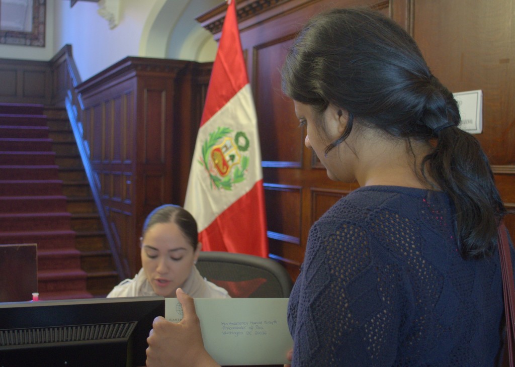 Shreema Mehta from Earthworks delivers the letter to the Peruvian Embassy.