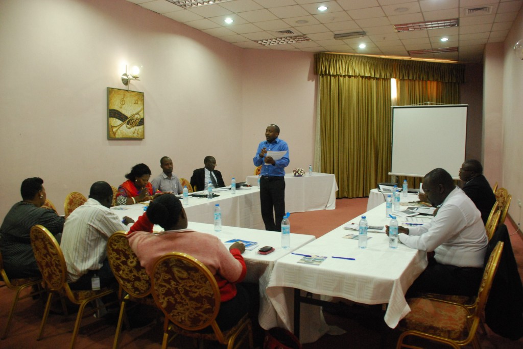 John Mwebe speaks to participants at the training
